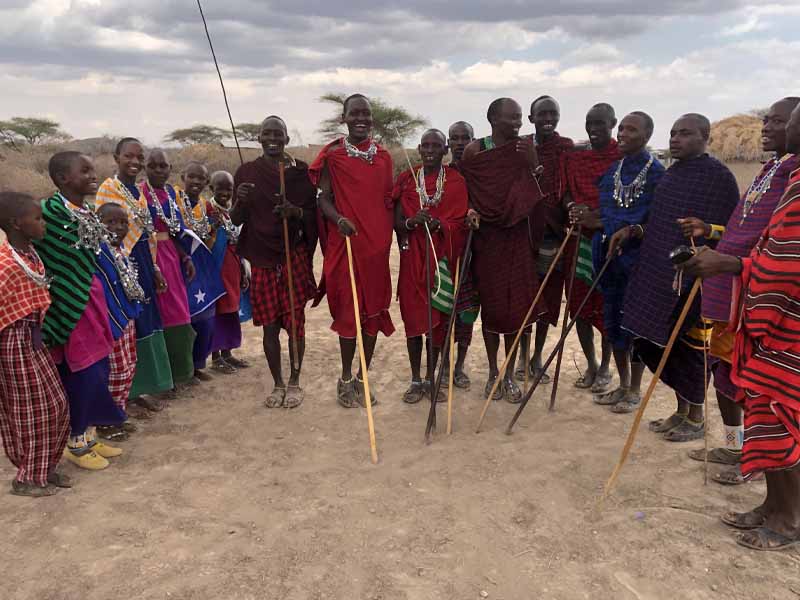 Boat, Maasai culture visit then fly back to Zanzibar photo 1